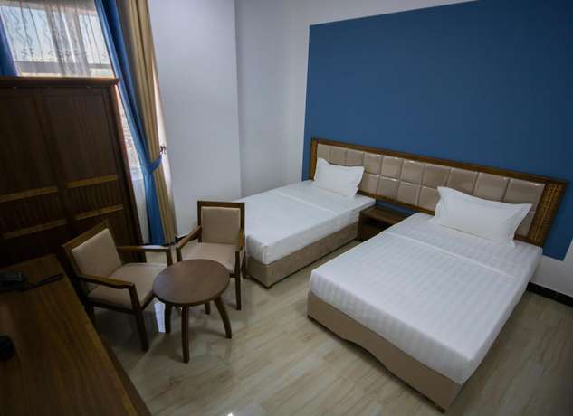 Imagen de la habitación del Hotel Home Station. Foto 13