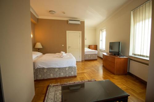 Imagen de la habitación del Hotel Home Story Sarajevo, Vogošća. Foto 16