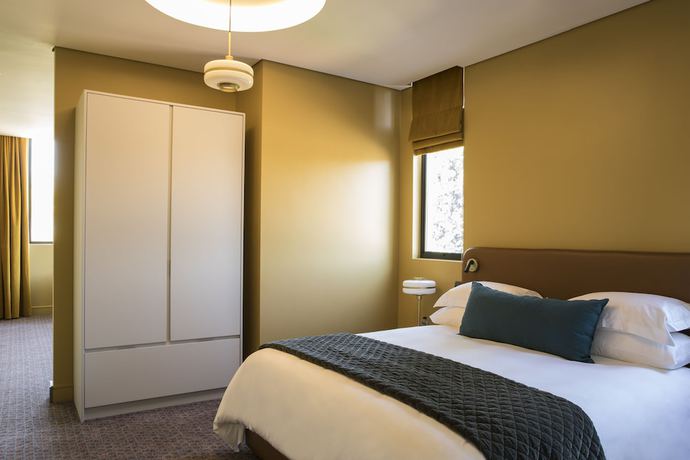 Imagen de la habitación del Hotel Home Suites Rosebank. Foto 3