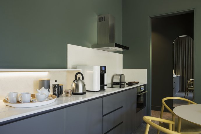 Imagen de la habitación del Hotel Home Suites Rosebank. Foto 5