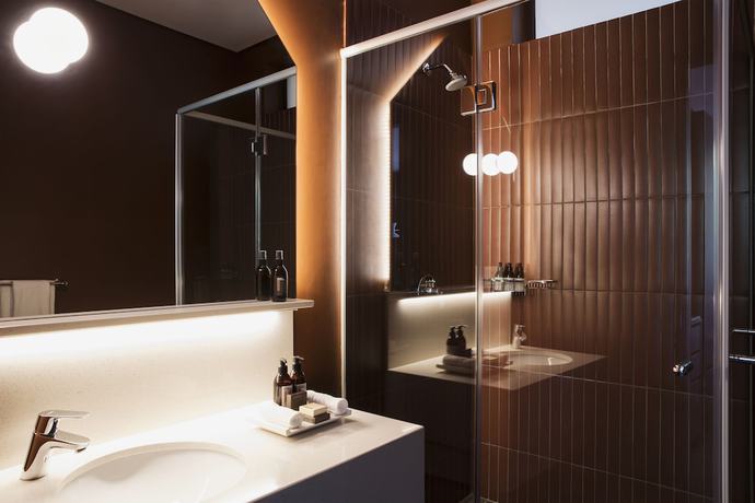 Imagen de la habitación del Hotel Home Suites Rosebank. Foto 11