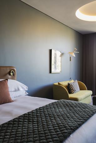 Imagen de la habitación del Hotel Home Suites Rosebank. Foto 12