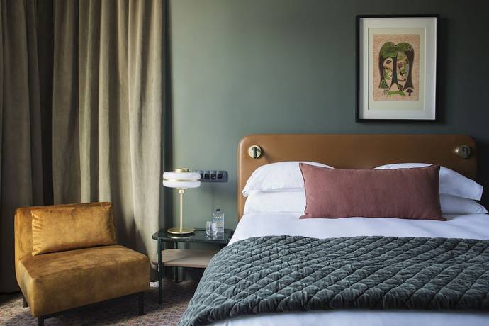 Imagen de la habitación del Hotel Home Suites Rosebank. Foto 13