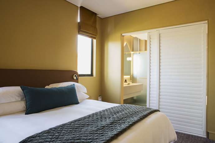 Imagen de la habitación del Hotel Home Suites Rosebank. Foto 14
