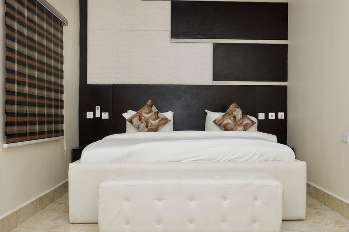 Imagen de la habitación del Hotel Home Suites and Resort. Foto 2