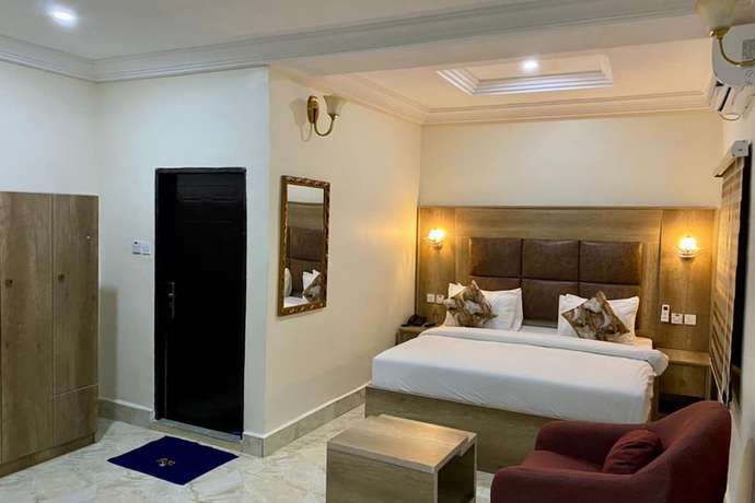 Imagen de la habitación del Hotel Home Suites and Resort. Foto 4