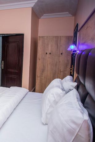 Imagen de la habitación del Hotel Home Suites and Resort. Foto 7