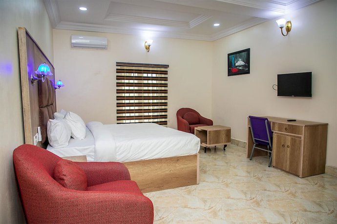 Imagen de la habitación del Hotel Home Suites and Resort. Foto 10