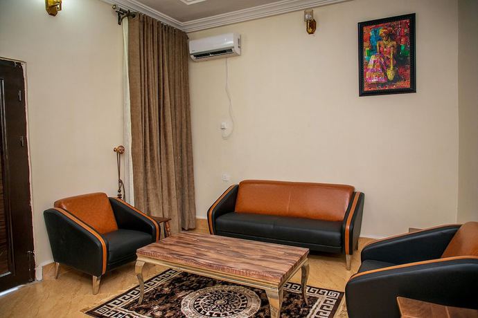 Imagen de la habitación del Hotel Home Suites and Resort. Foto 11