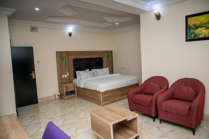 Imagen de la habitación del Hotel Home Suites and Resort. Foto 12