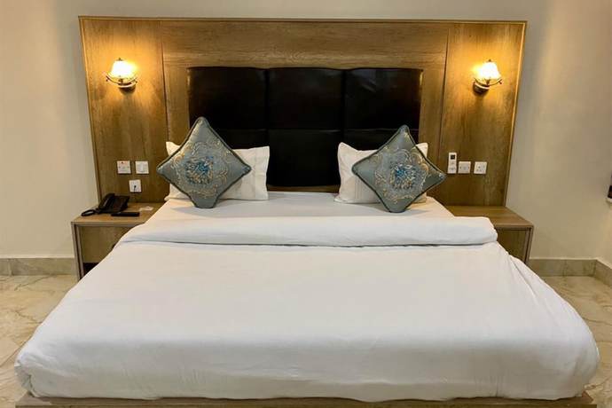 Imagen de la habitación del Hotel Home Suites and Resort. Foto 13