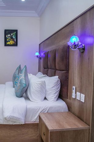 Imagen de la habitación del Hotel Home Suites and Resort. Foto 15