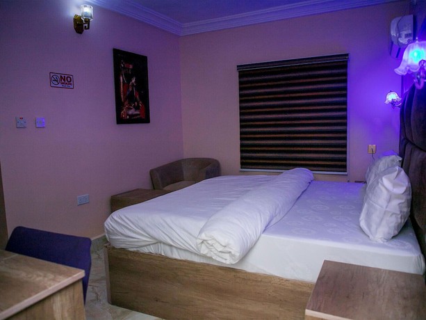 Imagen de la habitación del Hotel Home Suites and Resort. Foto 17