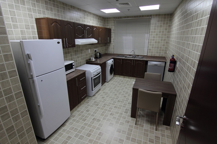 Imagen de la habitación del Hotel Home To Home Apartments. Foto 6