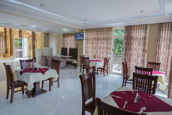 Imagen del bar/restaurante del Hotel Home Town Addis. Foto 2