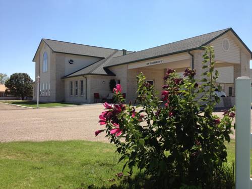 Imagen de la habitación del Hotel Home Town Inn. Foto 2