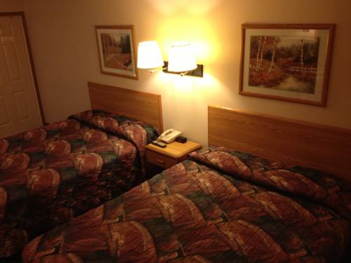 Imagen de la habitación del Hotel Home Town Inn. Foto 8