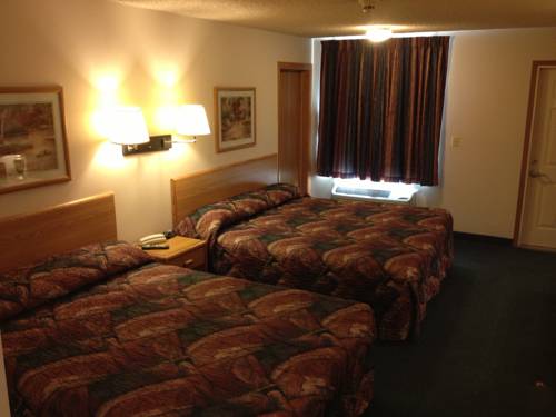 Imagen de la habitación del Hotel Home Town Inn. Foto 13