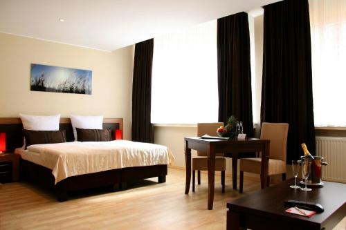Imagen de la habitación del Hotel Home, Wilhelmshaven. Foto 7