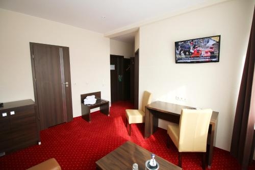 Imagen de la habitación del Hotel Home, Wilhelmshaven. Foto 8