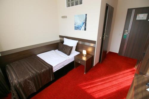 Imagen de la habitación del Hotel Home, Wilhelmshaven. Foto 9