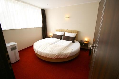 Imagen de la habitación del Hotel Home, Wilhelmshaven. Foto 10