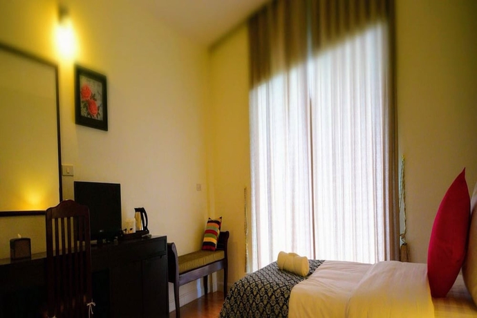 Imagen de la habitación del Hotel Home and Hill Resort. Foto 5