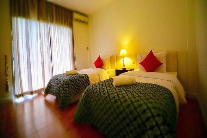 Imagen de la habitación del Hotel Home and Hill Resort. Foto 6