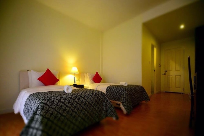 Imagen de la habitación del Hotel Home and Hill Resort. Foto 8