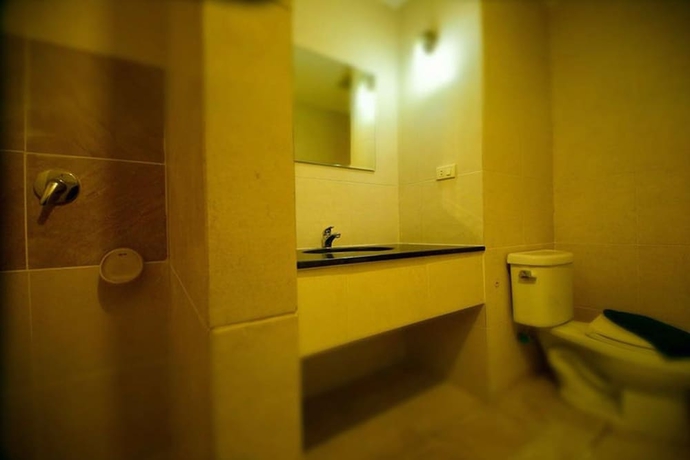 Imagen de la habitación del Hotel Home and Hill Resort. Foto 13