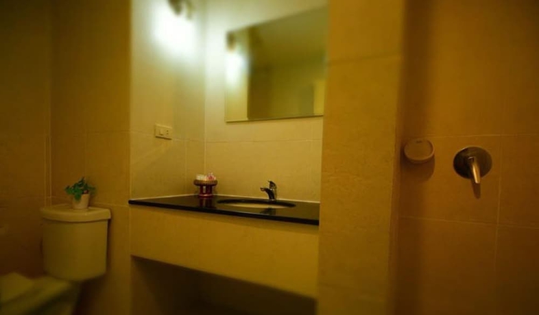 Imagen de la habitación del Hotel Home and Hill Resort. Foto 14