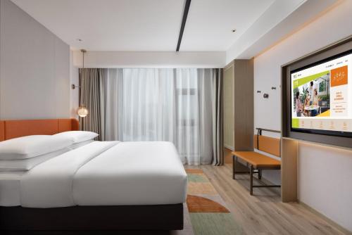 Imagen de la habitación del Hotel Home2 Suite By Hilton Wuxi Huishan. Foto 16