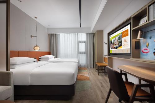 Imagen de la habitación del Hotel Home2 Suite By Hilton Wuxi Huishan. Foto 19