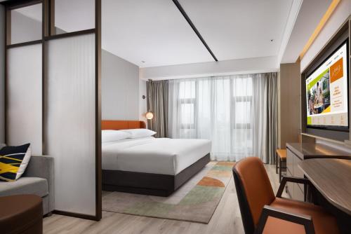 Imagen de la habitación del Hotel Home2 Suite By Hilton Wuxi Huishan. Foto 20