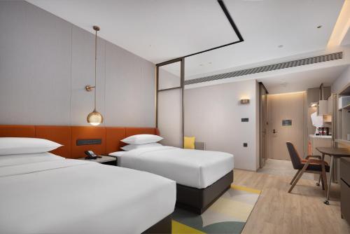 Imagen de la habitación del Hotel Home2 Suite by Hilton Changsha Ningxiang. Foto 16