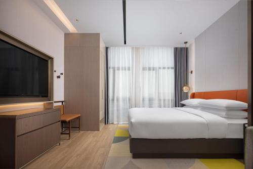Imagen de la habitación del Hotel Home2 Suite by Hilton Changsha Ningxiang. Foto 18