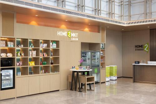 Imagen general del Hotel Home2 Suite by Hilton Chengdu Huaizhou New Town. Foto 6