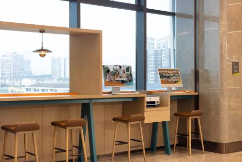 Imagen general del Hotel Home2 Suite by Hilton Chengdu Huaizhou New Town. Foto 10