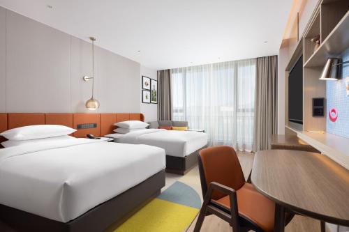 Imagen de la habitación del Hotel Home2 Suite by Hilton Guangzhou Conghua. Foto 15