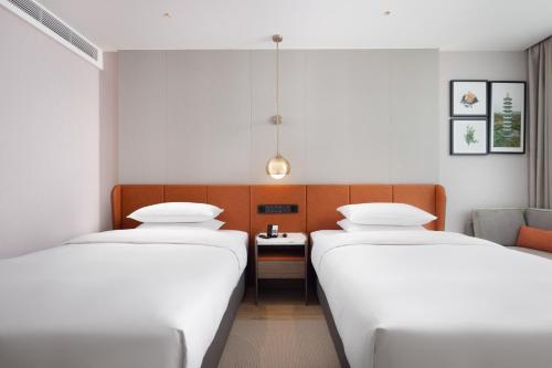 Imagen de la habitación del Hotel Home2 Suite by Hilton Guangzhou Conghua. Foto 16