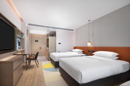 Imagen de la habitación del Hotel Home2 Suite by Hilton Guangzhou Conghua. Foto 17