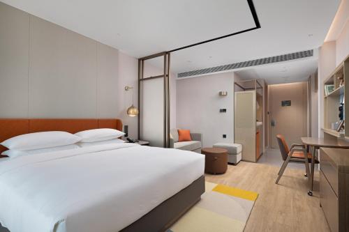Imagen de la habitación del Hotel Home2 Suite by Hilton Guangzhou Conghua. Foto 18