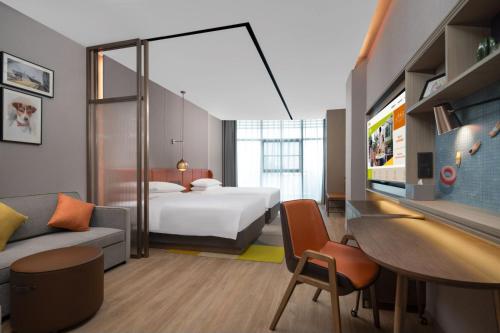 Imagen de la habitación del Hotel Home2 Suite by Hilton Guangzhou Huadu. Foto 17