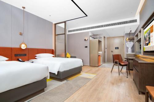 Imagen de la habitación del Hotel Home2 Suite by Hilton Guangzhou Huadu. Foto 19