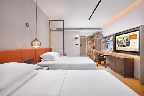 Imagen de la habitación del Hotel Home2 Suite by Hilton Guiyang Nanming Jiaxiu. Foto 14