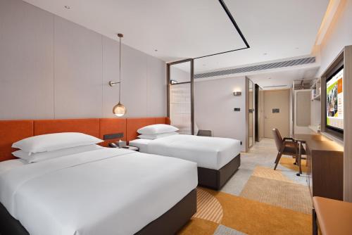 Imagen de la habitación del Hotel Home2 Suite by Hilton Guiyang Nanming Jiaxiu. Foto 15