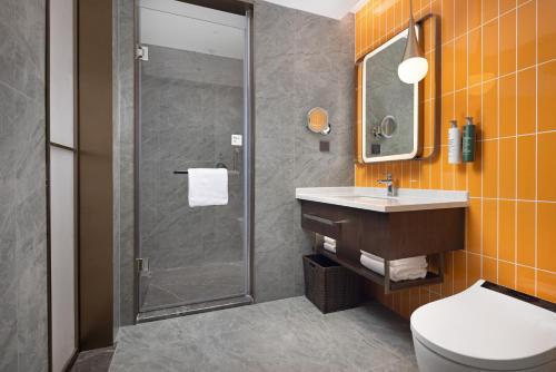 Imagen de la habitación del Hotel Home2 Suite by Hilton Guiyang Nanming Jiaxiu. Foto 20