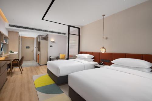 Imagen de la habitación del Hotel Home2 Suite by Hilton Hangzhou Qianjiang New Town. Foto 6
