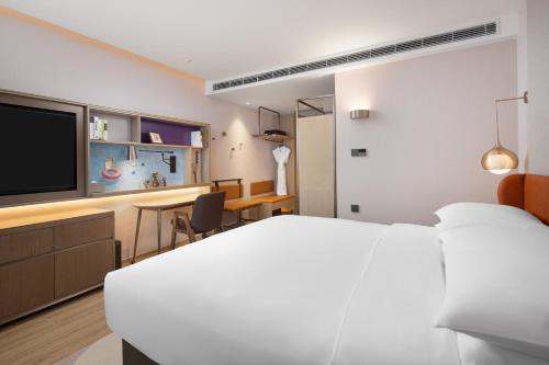Imagen de la habitación del Hotel Home2 Suite by Hilton Hangzhou Qianjiang New Town. Foto 11