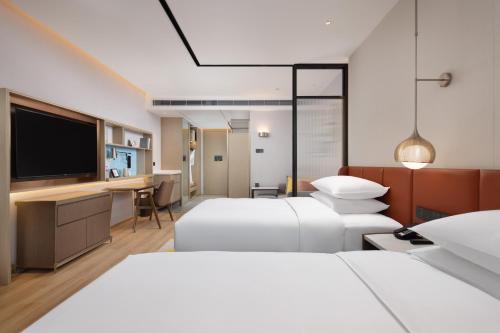 Imagen de la habitación del Hotel Home2 Suite by Hilton Hangzhou Qianjiang New Town. Foto 20